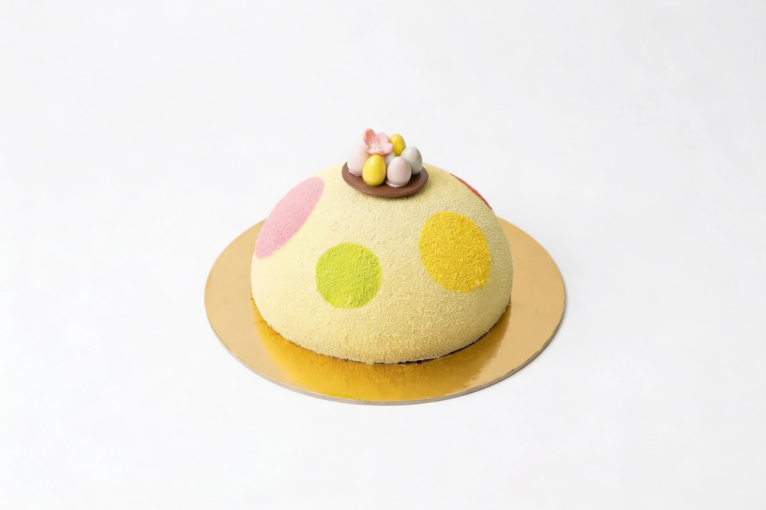 Easter Chocolate Cake — Indulgent chocolate sponge layered with rich chocolate filling, shaped into a refined dome and finished with a soft velvet coating, festive Easter eggs, and playful pastel accents.