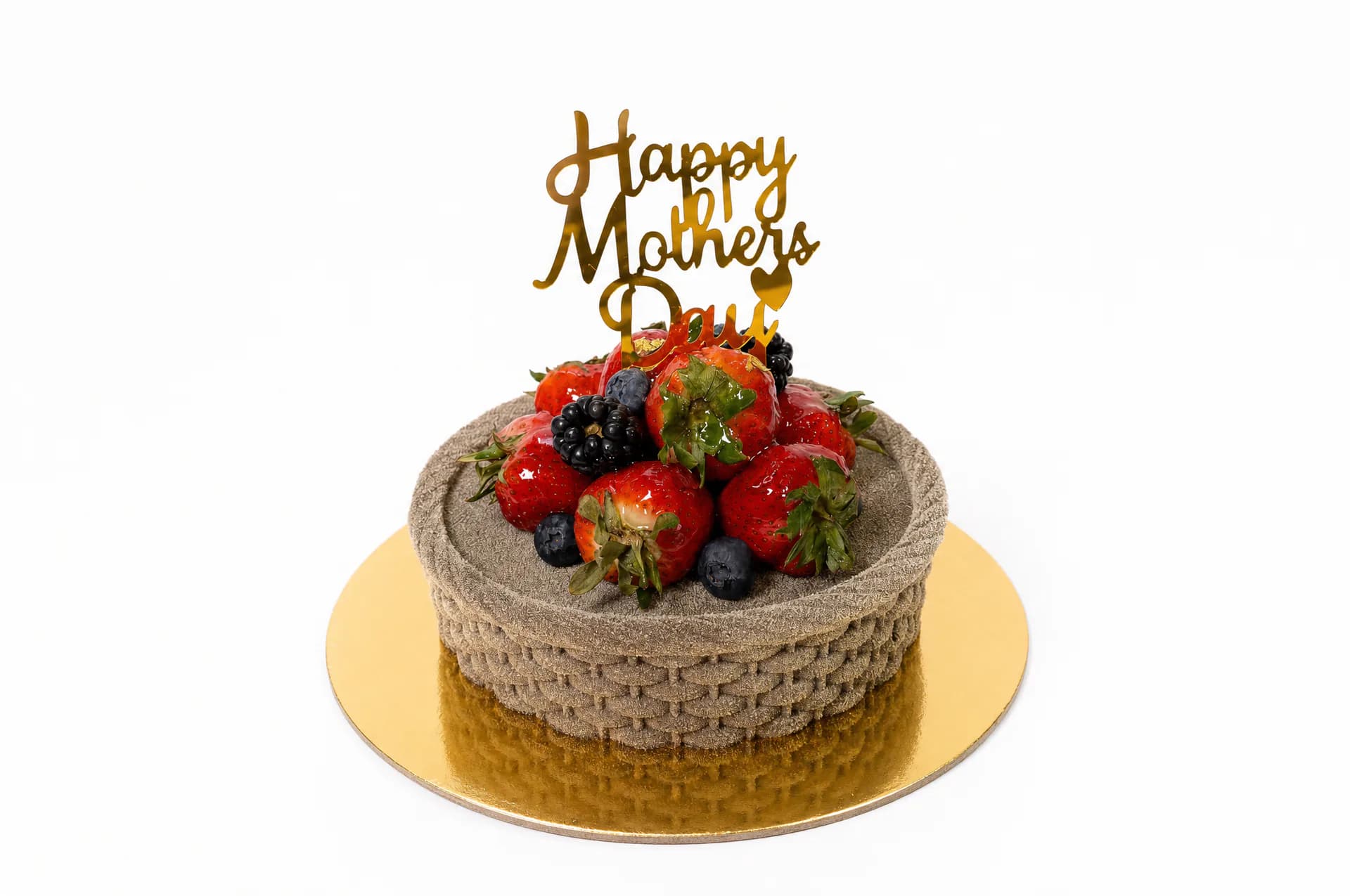 Mixed Berry Basket Cake — Delicate white vanilla sponge layered with fresh mixed berries and smooth vanilla cream, crafted into a refined 6-inch cake. Light, elegant, and perfectly balanced. Topped with a Happy Mother's Day cake topper.