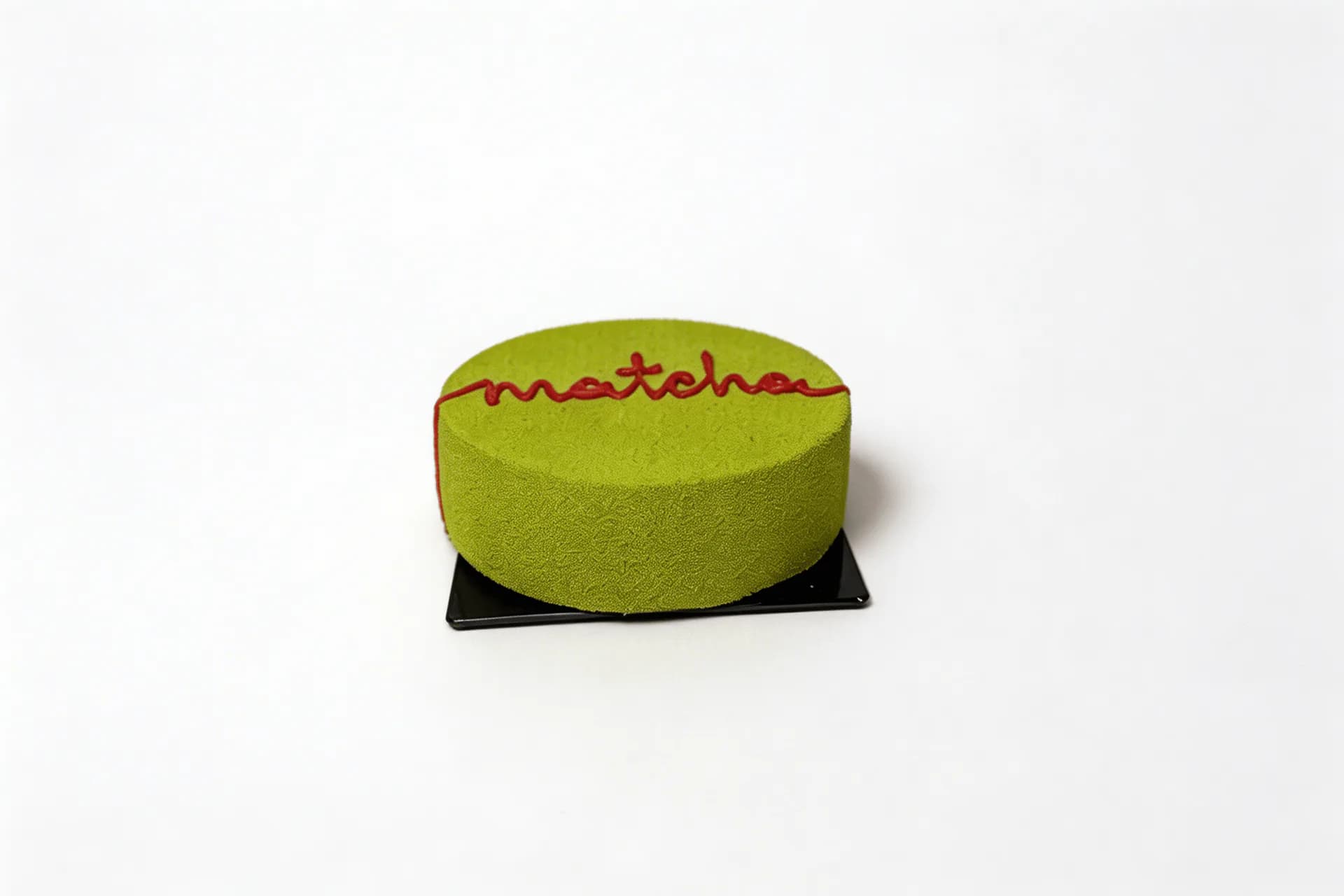 Strawberry Matcha Velvet Mother's Day — Smooth matcha mousse layered with a vibrant strawberry center, crafted into a light and refined cake.